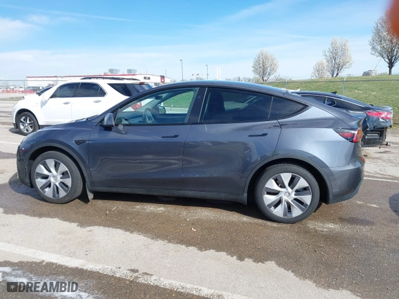 2023 Tesla Model Y Long Range with VIN 7SAYGDEE3PA204992, listed as a IAAI auction lot 41849104 with 22,490 mi miles. Bid and sale history available at carsss.com. Image 14.