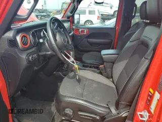 2020 Jeep Wrangler Unlimited Sport Altitude with VIN 1C4HJXDG2LW206079, listed as a Copart auction lot 59040695 with 77,917 mi miles and Salvage title. Bid and sale history available at DreamBid. Image 7.