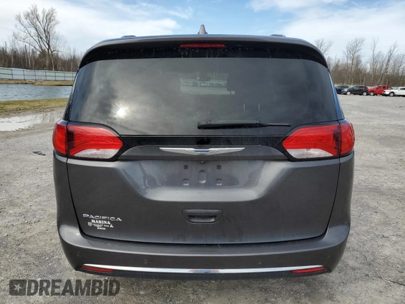 2018 Chrysler Pacifica Touring L z VIN 2C4RC1BG9JR143020, wystawiony jako Copart lot #49323205 z przebiegiem 126 389 mil mil oraz Szkody całkowita. Historia ofert i sprzedaży dostępna na DreamBid. Obrazek 6.