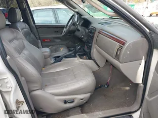 2003 Jeep Grand Cherokee Limited with VIN 1J4GW58N63C505919, listed as a IAAI auction lot 41566997 with 233,827 mi miles. Bid and sale history available at carsss.com. Image 5.