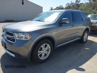 2012 Dodge Durango Crew with VIN 1C4RDHDG2CC317136, listed as a IAAI auction lot 41993837 with 131,048 mi miles and . Bid and sale history available at DreamBid. Image 2.
