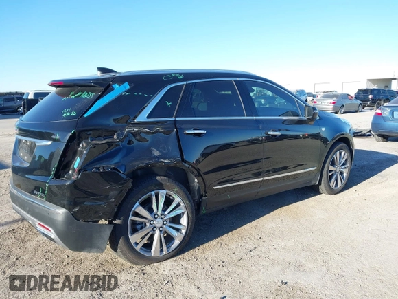 2024 Cadillac XT5 FWD Premium Luxury with VIN 1GYKNCRS4RZ729461, listed as a IAAI auction lot 41411300 with 5,760 mi miles. Bid and sale history available at carsss.com. Image 6.