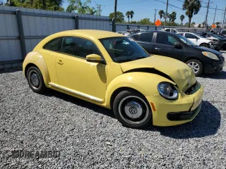 2012 Volkswagen Beetle 2.5L PZEV with VIN 3VWJP7AT0CM628771, listed as a Copart auction lot 47974775 with 70,940 mi miles and Salvage Title. Bid and sale history available at carsss.com. Image 4.