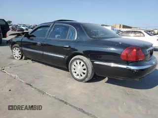 2002 Lincoln Continental with VIN 1LNHM97V92Y685600, listed as a Copart auction lot 68709774 with 243,688 mi miles and Salvage Title. Bid and sale history available at carsss.com. Image 2.