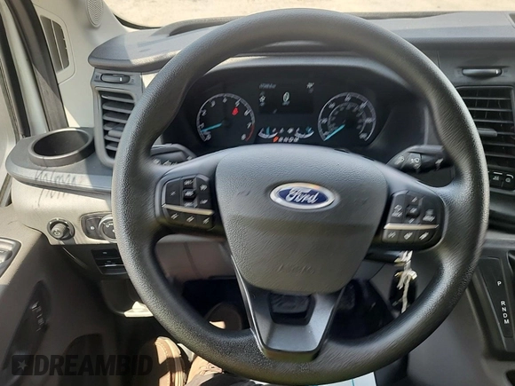 2023 Ford Transit Cargo with VIN 1FTBR1X87PKC01635, listed as a IAAI auction lot 42832727 with 17,348 mi miles and . Bid and sale history available at DreamBid. Image 24.