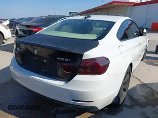 2014 BMW 4 Series 428i xDrive z VIN WBA3N9C50EF722242, wystawiony jako IAAI lot #41526322 z przebiegiem 134 254 mil mil oraz . Historia ofert i sprzedaży dostępna na DreamBid. Obrazek 4.