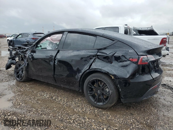 2024 Tesla Model Y z VIN 7SAYGDED7RF018059, wystawiony jako Copart lot #54273785 z przebiegiem 30 080 mil mil oraz Szkoda całkowita • Salvage title. Historia ofert i sprzedaży dostępna na DreamBid. Obrazek 2.