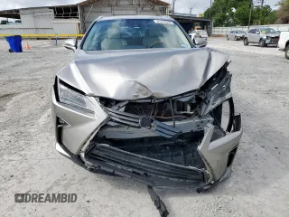 2017 Lexus RX 450h with VIN 2T2BGMCAXHC008829, listed as a Copart auction lot 61410365 with 70,463 mi miles and Salvage title. Bid and sale history available at DreamBid. Image 5.