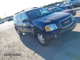 2003 GMC Envoy SLT z VIN 1GKET16S736233956, wystawiony jako IAAI lot #41844351 z przebiegiem 244 942 mil mil oraz . Historia ofert i sprzedaży dostępna na DreamBid. Obrazek 1.