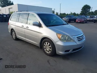 2010 Honda Odyssey EX-L z VIN 5FNRL3H75AB071201, wystawiony jako IAAI lot #42725350 z przebiegiem 263 335 mil mil oraz . Historia ofert i sprzedaży dostępna na DreamBid. Obrazek 1.