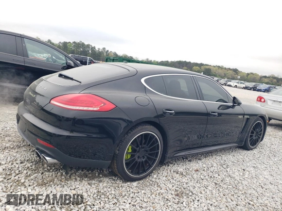2015 Porsche Panamera S E-Hybrid z VIN WP0AD2A72FL040409, wystawiony jako Copart lot #51445505 z przebiegiem 112 238 mil mil oraz Tytuł czysty. Historia ofert i sprzedaży dostępna na DreamBid. Obrazek 3.