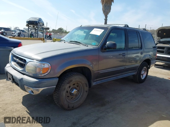 1999 Ford Explorer XLT z VIN 1FMZU32E8XUA34921, wystawiony jako IAAI lot #42162432 z przebiegiem 263 443 mil mil oraz . Historia ofert i sprzedaży dostępna na DreamBid. Obrazek 2.