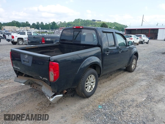 2015 Nissan Frontier S with VIN 1N6AD0EV2FN735908, listed as a IAAI auction lot 42388456 with 164,889 mi miles and . Bid and sale history available at DreamBid. Image 4.