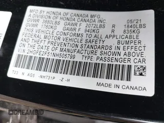 2022 Honda Civic Sport with VIN 2HGFE2F51NH505799, listed as a IAAI auction lot 41850770 with 36,069 mi miles and . Bid and sale history available at carsss.com. Image 9.