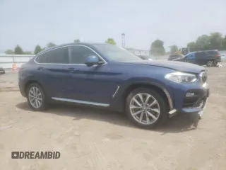 2019 BMW X4 xDrive30i with VIN 5UXUJ3C52KLG51818, listed as a Copart auction lot 59573625 with 77,841 mi miles and Salvage title. Bid and sale history available at DreamBid. Image 4.