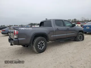 2021 Toyota Tacoma 4WD SR5 with VIN 5TFDZ5BN8MX062787, listed as a Copart auction lot 44987135 with 59,351 mi miles and Salvage Title. Bid and sale history available at carsss.com. Image 3.