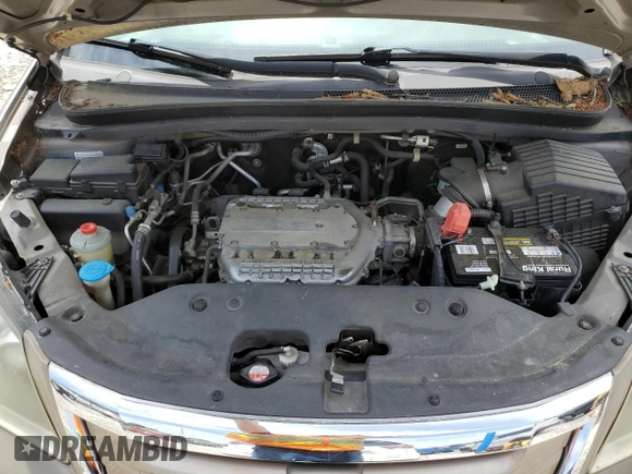 2010 Honda Odyssey EX z VIN 5FNRL3H47AB005755, wystawiony jako Copart lot #59584305 z przebiegiem 90 338 mil mil oraz Szkoda całkowita • Salvage title. Historia ofert i sprzedaży dostępna na DreamBid. Obrazek 12.