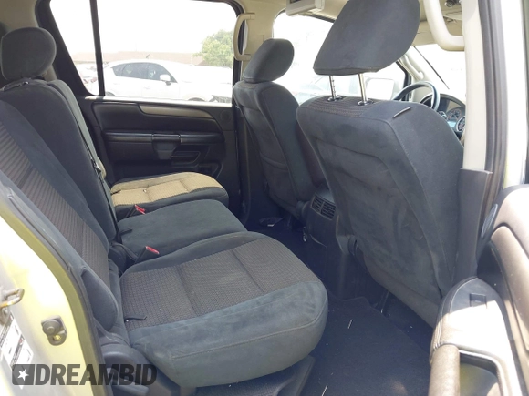 2014 Nissan Armada SV z VIN 5N1BA0ND7EN600201, wystawiony jako IAAI lot #42154850 z przebiegiem 290 225 mil mil oraz . Historia ofert i sprzedaży dostępna na DreamBid. Obrazek 8.