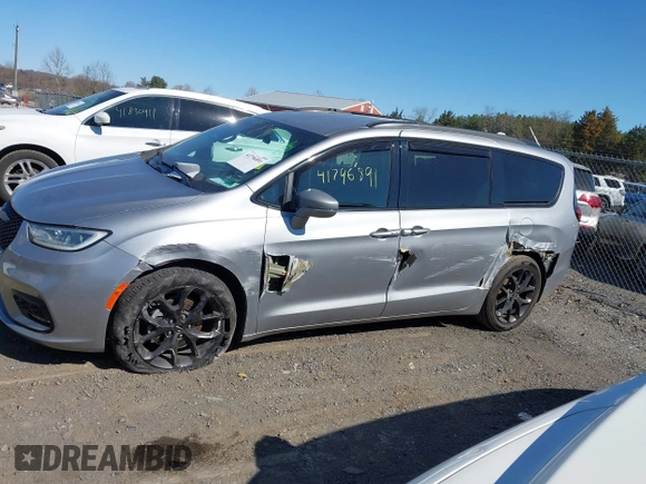 2021 Chrysler Pacifica Touring z VIN 2C4RC1FG8MR565455, wystawiony jako IAAI lot #41796891 z przebiegiem 105 645 mil mil oraz . Historia ofert i sprzedaży dostępna na DreamBid. Obrazek 14.