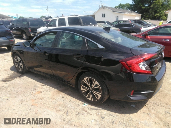 2016 Honda Civic EX-L z VIN 19XFC1F74GE041373, wystawiony jako IAAI lot #42201565 z przebiegiem 122 069 mil mil oraz . Historia ofert i sprzedaży dostępna na DreamBid. Obrazek 3.