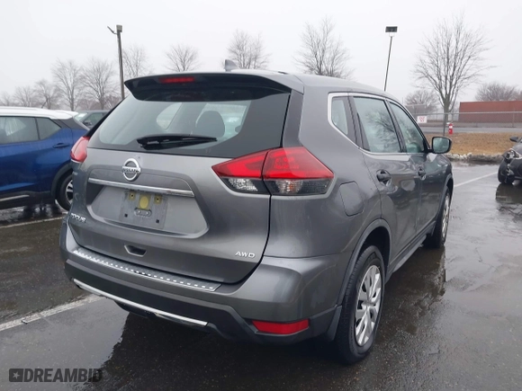 2018 Nissan Rogue S with VIN JN8AT2MV2JW312868, listed as a IAAI auction lot 41544774 with 80,739 mi miles. Bid and sale history available at carsss.com. Image 4.