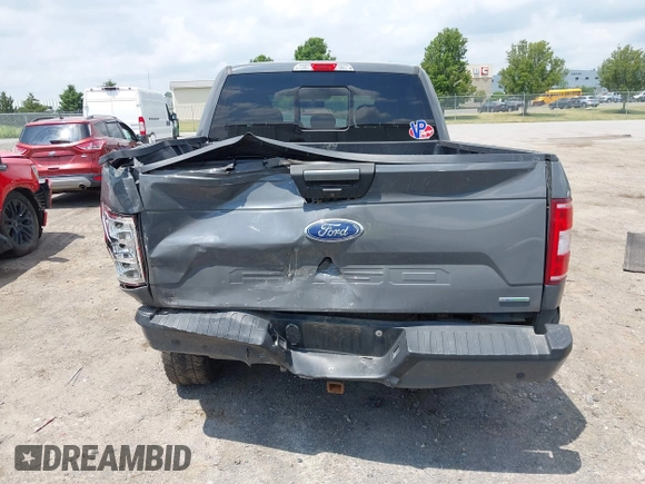 2018 Ford F-150 XL with VIN 1FTEW1EPXJFD25656, listed as a IAAI auction lot 42650683 with 119,326 mi miles and . Bid and sale history available at DreamBid. Image 16.