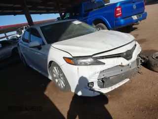 2020 Toyota Camry LE with VIN 4T1C11AK7LU401666, listed as a IAAI auction lot 41865235 with 69,189 mi miles. Bid and sale history available at carsss.com. Image 1.