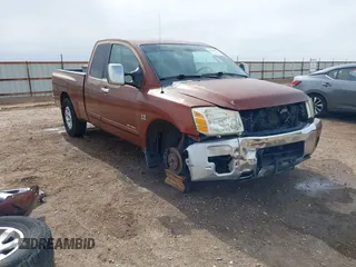 2004 Nissan Titan XE with VIN 1N6AA06A04N508069, listed as a IAAI auction lot 41571931 with 180,119 mi miles. Bid and sale history available at carsss.com. Image 1.
