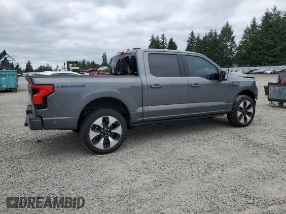 2023 Ford F-150 Lightning Pro with VIN 1FT6W1EV9PWG25278, listed as a Copart auction lot 60293095 with 24,450 mi miles and Salvage title. Bid and sale history available at DreamBid. Image 3.