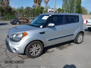 2012 Kia Soul + with VIN KNDJT2A62C7370341, listed as a IAAI auction lot 42102484 with 67,116 mi miles. Bid and sale history available at carsss.com. Image 2.