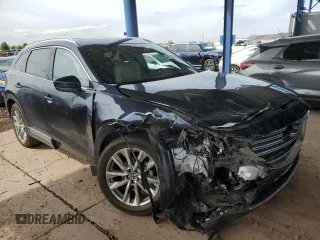 2018 Mazda CX-9 Grand Touring z VIN JM3TCADY2J0220873, wystawiony jako Copart lot #49264875 z przebiegiem Nie podano mil oraz Szkoda całkowita • Salvage title. Historia ofert i sprzedaży dostępna na DreamBid. Obrazek 4.