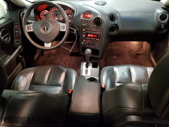 2007 Pontiac Grand Prix с VIN 2G2WP552271158324, выставлен на аукционе Copart как лот 57459505 с пробегом 219 773 миль миль и Списание • Salvage title. История ставок и продаж доступна на DreamBid. Изображение 8.