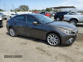 2015 Mazda 3 S Touring with VIN JM1BM1V3XF1219587, listed as a Copart auction lot 49491275 with 87,880 mi miles and Salvage Title. Bid and sale history available at DreamBid. Image 4.