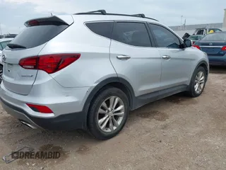 2018 Hyundai Santa Fe 2.0T z VIN 5XYZU4LA9JG537310, wystawiony jako IAAI lot #42393689 z przebiegiem Nie podano mil oraz . Historia ofert i sprzedaży dostępna na DreamBid. Obrazek 4.