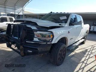2021 Ram 2500 Laramie with VIN 3C6UR5NLXMG677847, listed as a IAAI auction lot 40992410 with 106,912 mi miles. Bid and sale history available at carsss.com. Image 17.