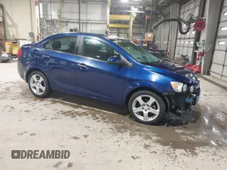 2014 Chevrolet Sonic LTZ with VIN 1G1JE5SB5E4226187, listed as a IAAI auction lot 41521689 with 73,325 mi miles. Bid and sale history available at carsss.com. Image 1.