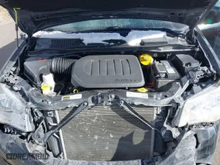 2019 Dodge Grand Caravan SXT with VIN 2C4RDGCG1KR591056, listed as a IAAI auction lot 41562752 with 62,104 mi miles. Bid and sale history available at carsss.com. Image 10.