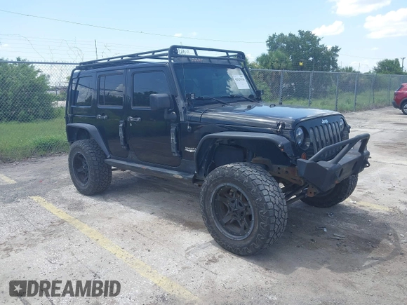2012 Jeep Wrangler Unlimited Altitude with VIN 1C4HJWEG5CL161049, listed as a IAAI auction lot 42629330 with 217,147 mi miles and . Bid and sale history available at DreamBid. Image 1.