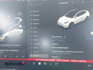 2021 Tesla Model Y Long Range with VIN 5YJYGAEE6MF196610, listed as a IAAI auction lot 41516909 with 30,431 mi miles. Bid and sale history available at carsss.com. Image 7.
