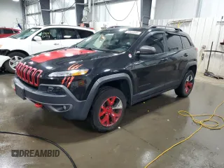 2015 Jeep Cherokee Trailhawk with VIN 1C4PJMBS5FW587545, listed as a Copart auction lot 58820685 with 136,755 mi miles and Salvage title. Bid and sale history available at DreamBid. Image 1.