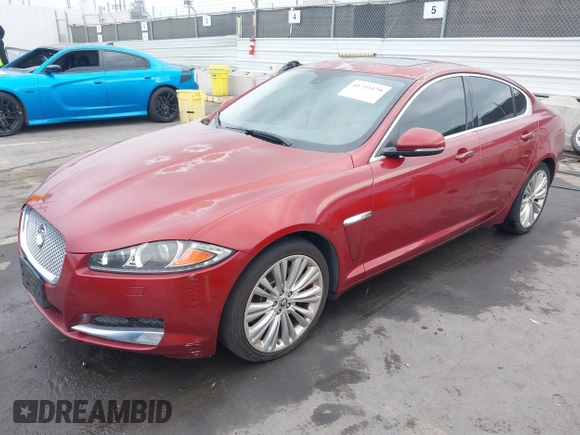 2012 Jaguar XF Portfolio with VIN SAJWA0HB5CLS21062, listed as a IAAI auction lot 41733179 with 125,614 mi miles. Bid and sale history available at carsss.com. Image 2.