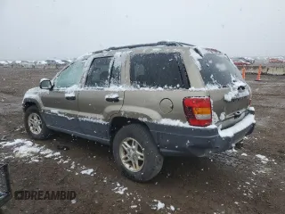 2004 Jeep Grand Cherokee Laredo with VIN 1J4GW48N94C408435, listed as a Copart auction lot 53101955 with Not provided miles and Clean title. Bid and sale history available at DreamBid. Image 2.