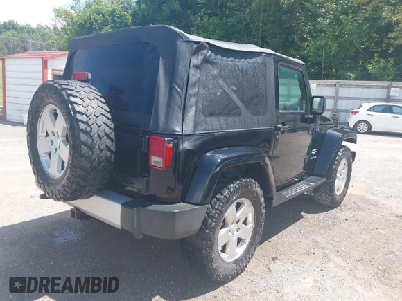 2010 Jeep Wrangler Sahara z VIN 1J4AA5D16AL110711, wystawiony jako IAAI lot #42751095 z przebiegiem 266 079 mil mil oraz . Historia ofert i sprzedaży dostępna na DreamBid. Obrazek 4.