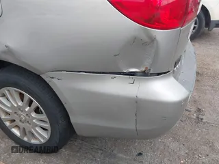 2007 Toyota Sienna XLE z VIN 5TDBK22C07S005499, wystawiony jako IAAI lot #42304686 z przebiegiem 179 721 mil mil oraz . Historia ofert i sprzedaży dostępna na DreamBid. Obrazek 15.