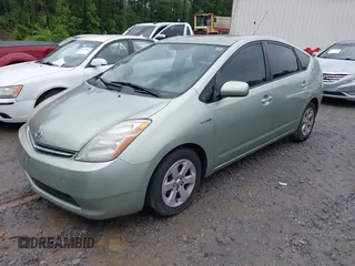 2007 Toyota Prius z VIN JTDKB20U077602951, wystawiony jako IAAI lot #42384098 z przebiegiem 169 136 mil mil oraz . Historia ofert i sprzedaży dostępna na DreamBid. Obrazek 2.
