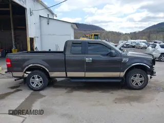 2006 Ford F-150 XLT with VIN 1FTPX14506NB16011, listed as a IAAI auction lot 41970983 with 211,235 mi miles. Bid and sale history available at carsss.com. Image 14.