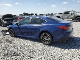 2025 Toyota Camry LE with VIN 4T1DAACK0SU075581, listed as a Copart auction lot 54570525 with 2,329 mi miles and Non Repairable. Bid and sale history available at DreamBid. Image 2.