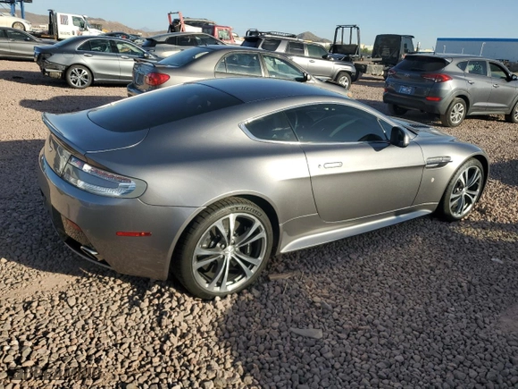 2011 Aston Martin V12 Vantage Carbon Black with VIN SCFEBBCF4BGS00791, listed as a Copart auction lot 76911374 with 8,207 mi miles and Salvage Title. Bid and sale history available at carsss.com. Image 3.