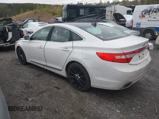 2013 Hyundai Azera with VIN KMHFH4JG0DA216691, listed as a IAAI auction lot 41704694 with 200,228 mi miles and . Bid and sale history available at DreamBid. Image 3.