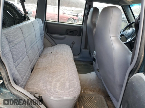 1997 Jeep Cherokee SE with VIN 1J4FJ28S0VL546175, listed as a Copart auction lot 89046155 with 0 mi miles and Non Repairable. Bid and sale history available at carsss.com. Image 11.